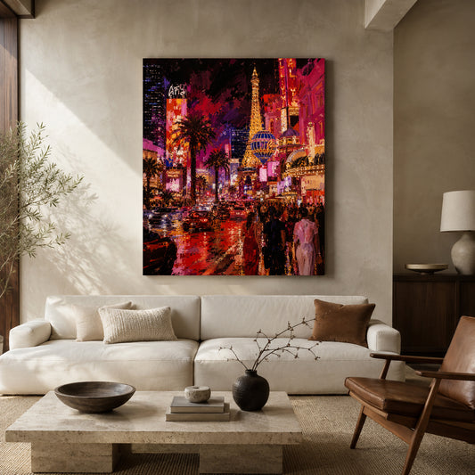 A large vertical canvas print of a vibrant, colorful Las Vegas night scene with the Eiffel Tower and illuminated buildings, displayed on a beige wall above a modern white sofa in a styled living room.