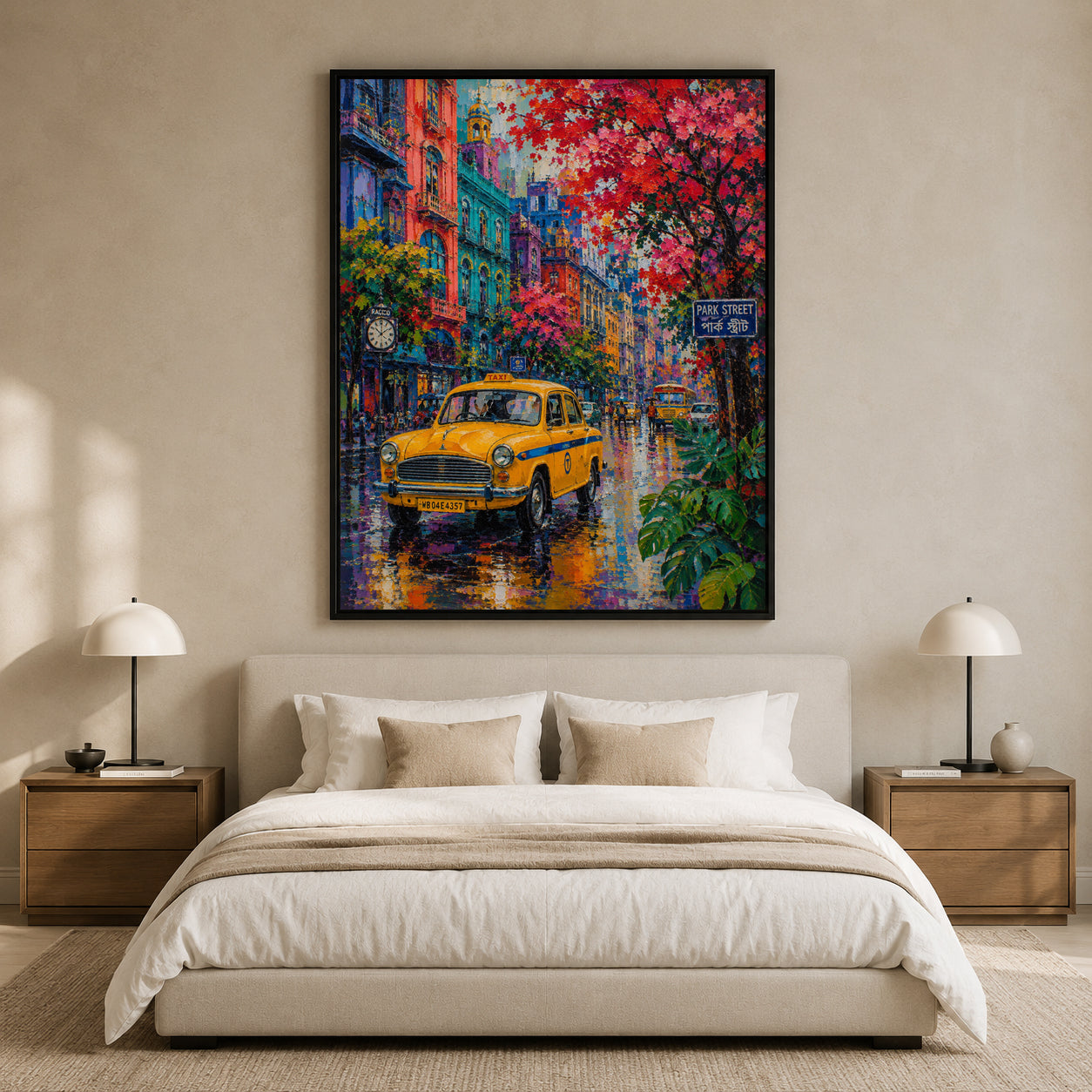 A large framed canvas print of a colorful city street scene with a yellow taxi and red flowering trees, displayed above a neatly made bed in a modern beige bedroom with two bedside lamps.