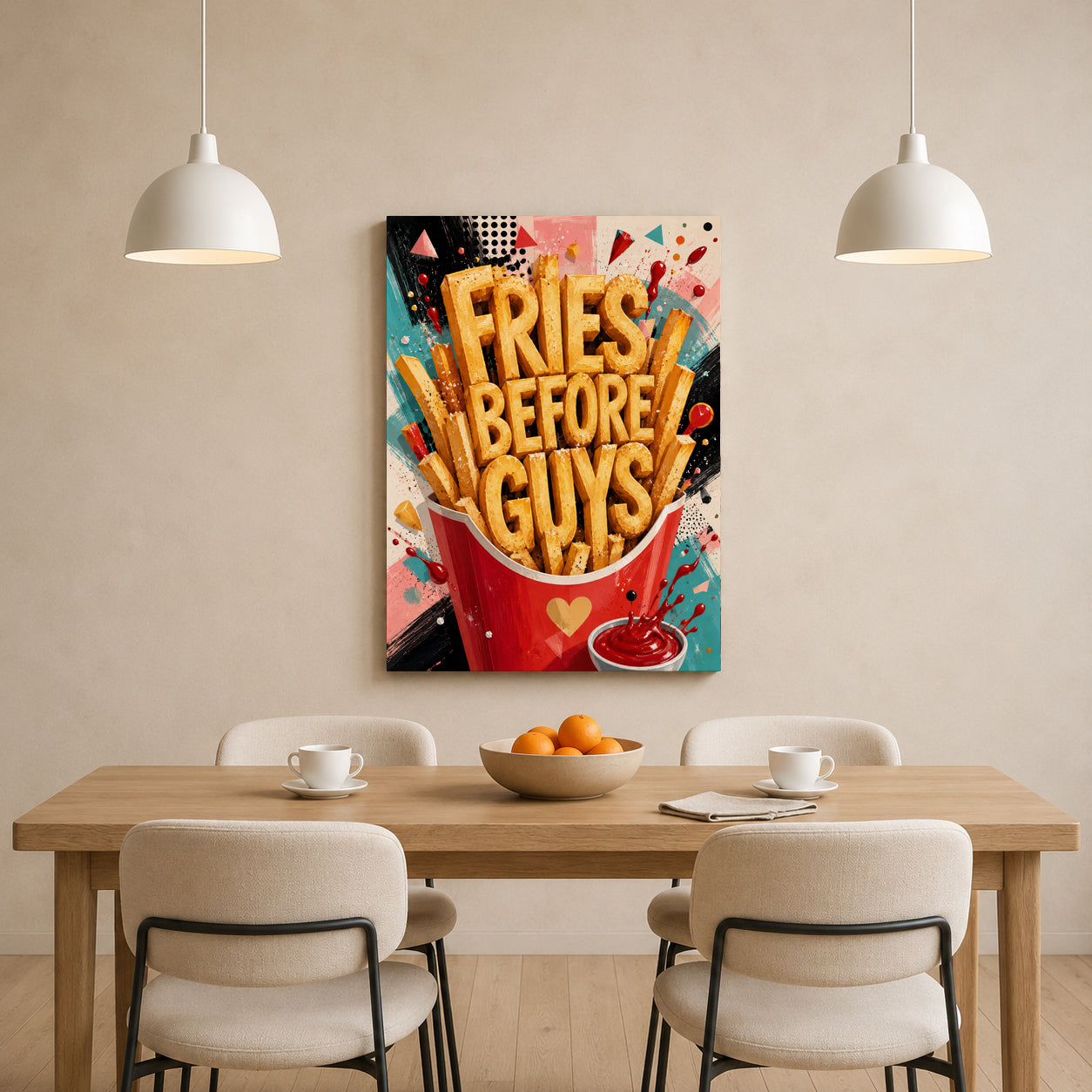 A colorful wall art print featuring the text 'FRIES BEFORE GUYS' in bold lettering, displayed above a wooden dining table with chairs in a modern room setting.