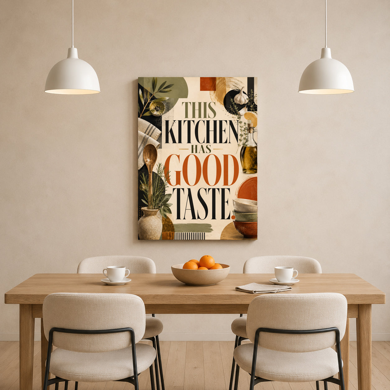 A vertical canvas wall art print with the text 'THIS KITCHEN HAS GOOD TASTE' in large black and orange lettering, surrounded by kitchen-themed illustrations, hanging on a beige wall above a wooden dining table with four chairs and two hanging pendant lights.