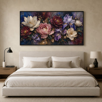 A large rectangular floral wall art piece hangs above a neatly made bed in a modern bedroom. The artwork shows a dense bouquet of flowers in white, pink, purple, burgundy, and blue tones against a dark painterly background.