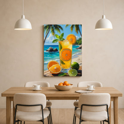 A vertical canvas wall art print depicting a tropical beach scene with a glass of orange juice, limes, and palm trees, displayed on a beige wall above a wooden dining table with chairs.